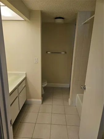 a view of a swimming pool and a yard