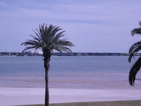 a view of a lake with sitting area