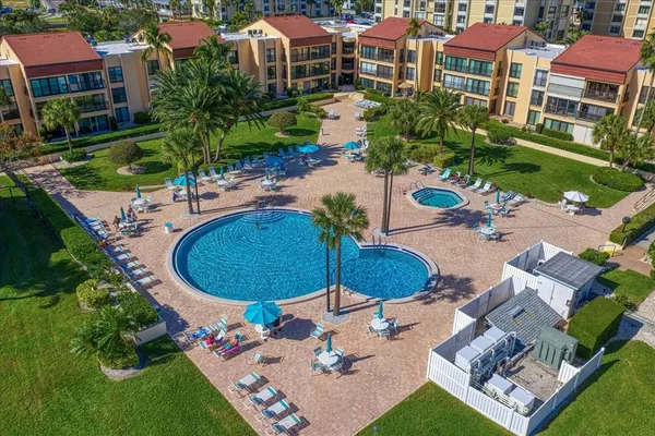 a view of a swimming pool with a sitting space