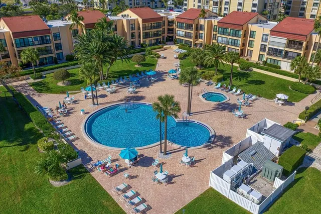 a view of a swimming pool with a sitting space