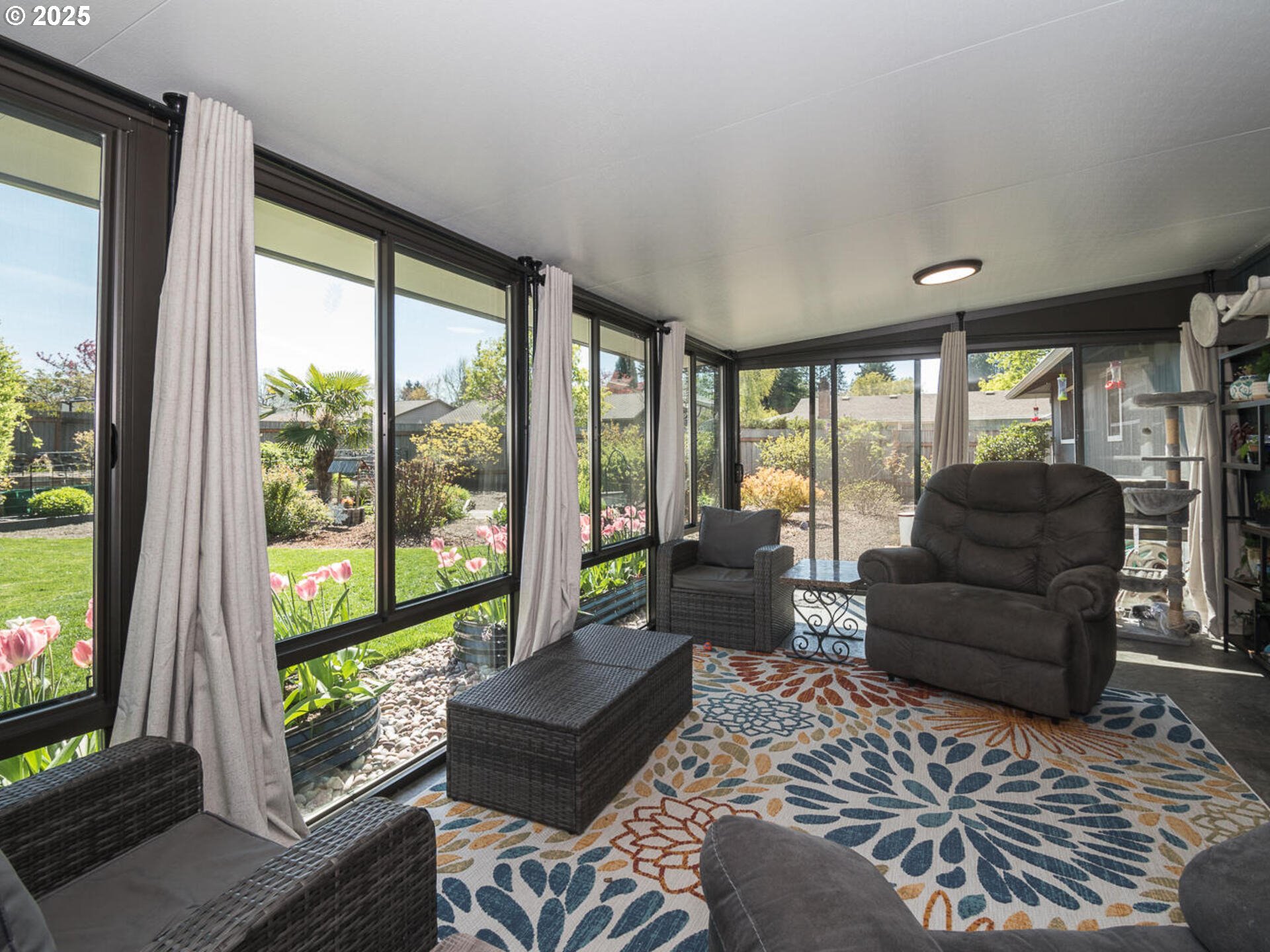 2548 Southeast Eagle Avenue Gresham, OR 97080 - Photo 11 of 32 a living room with furniture and a large window