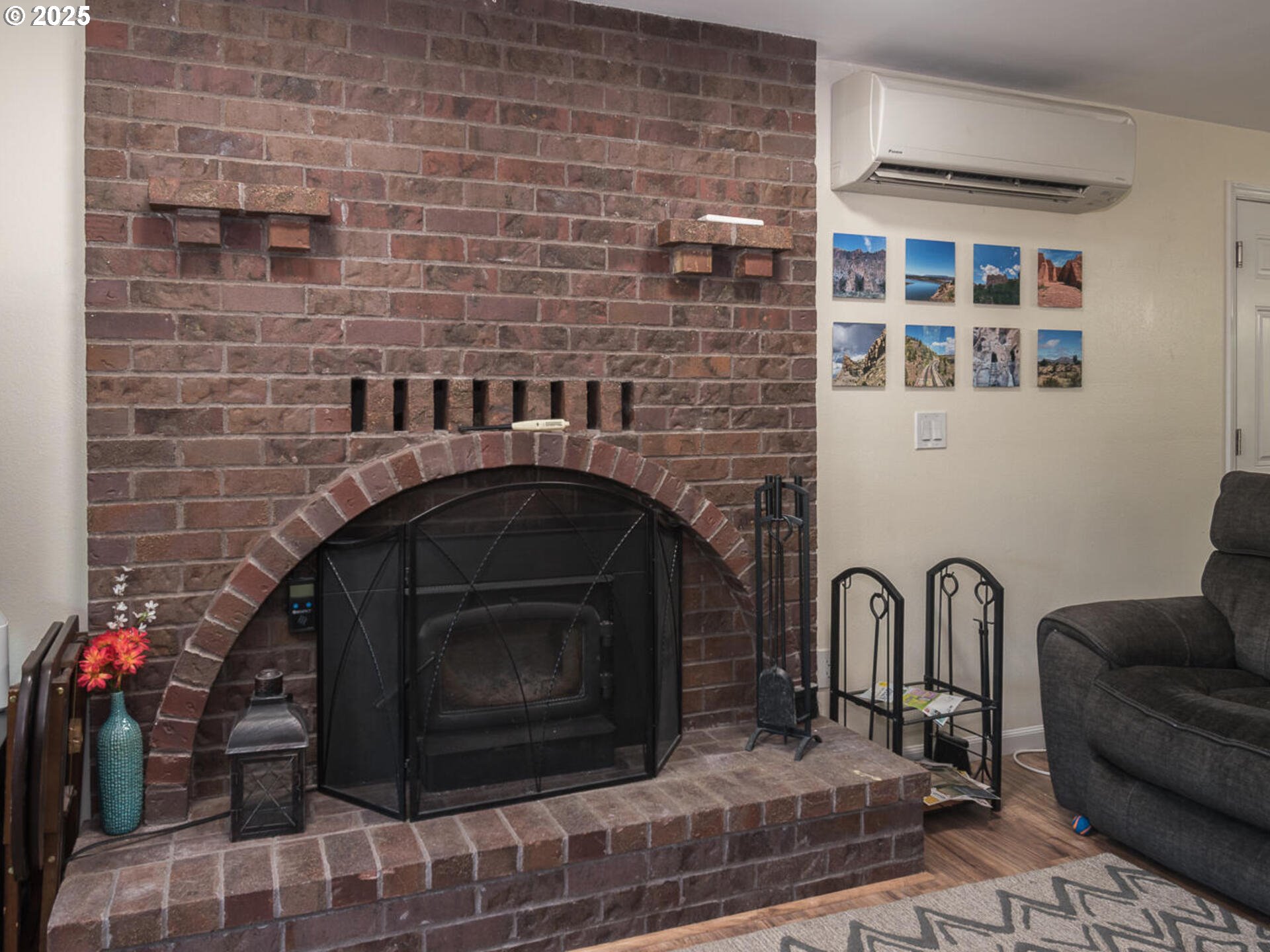 2548 Southeast Eagle Avenue Gresham, OR 97080 - Photo 14 of 32 a living room with furniture and a fireplace