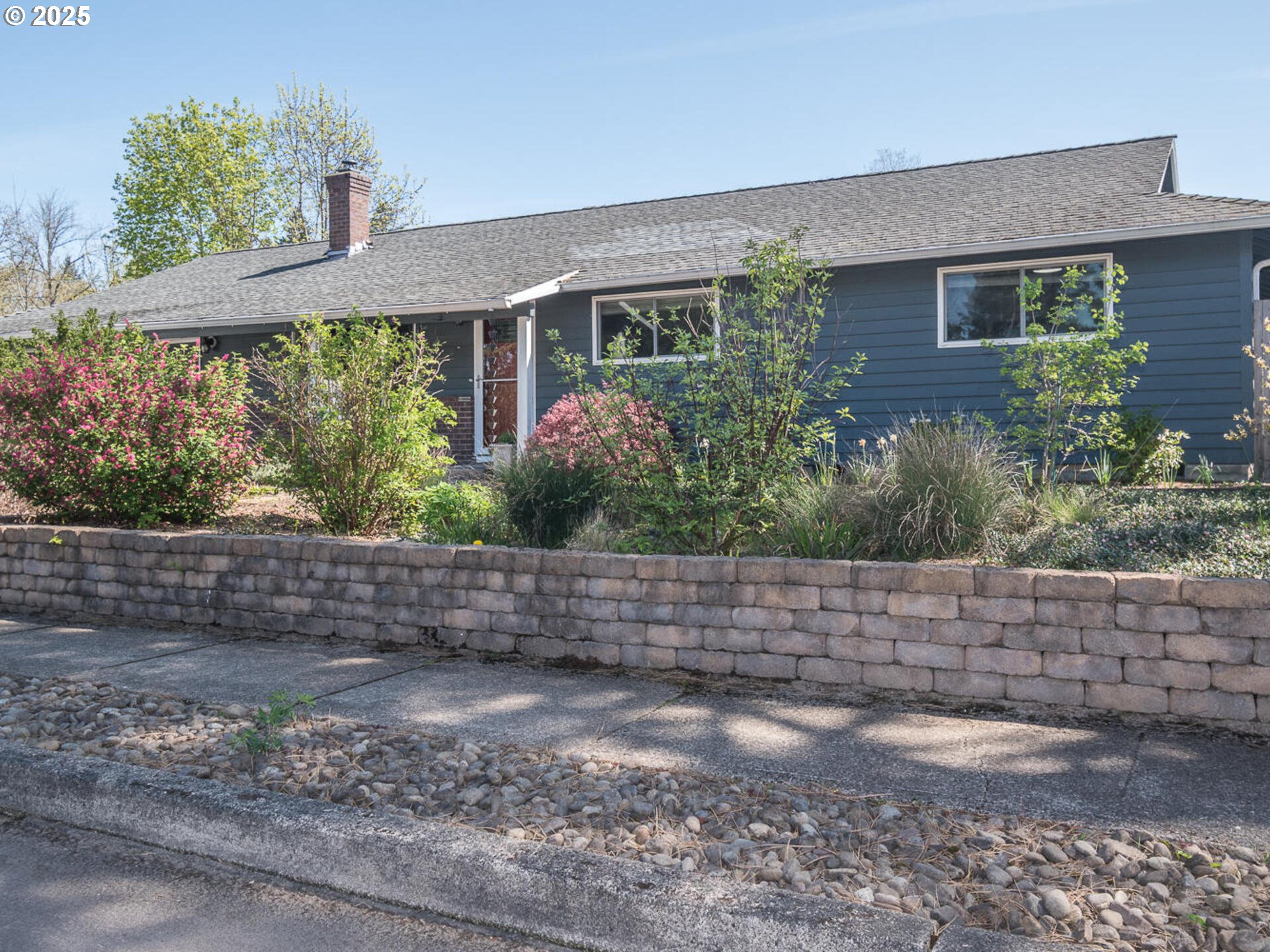 2548 Southeast Eagle Avenue Gresham, OR 97080 - Photo 2 of 32 a view of house with a yard