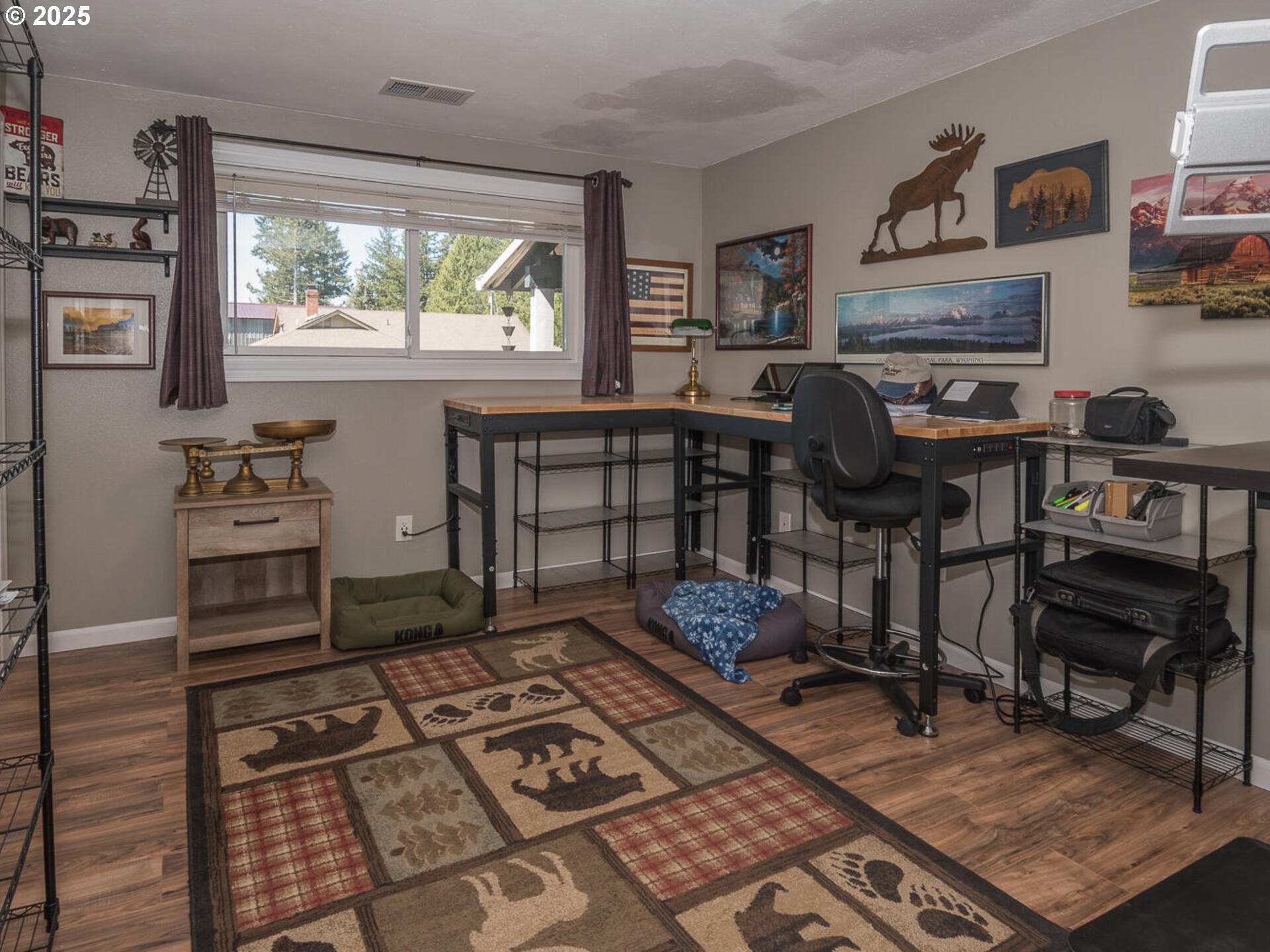 2548 Southeast Eagle Avenue Gresham, OR 97080 - Photo 22 of 32 a living room with furniture a window and a table