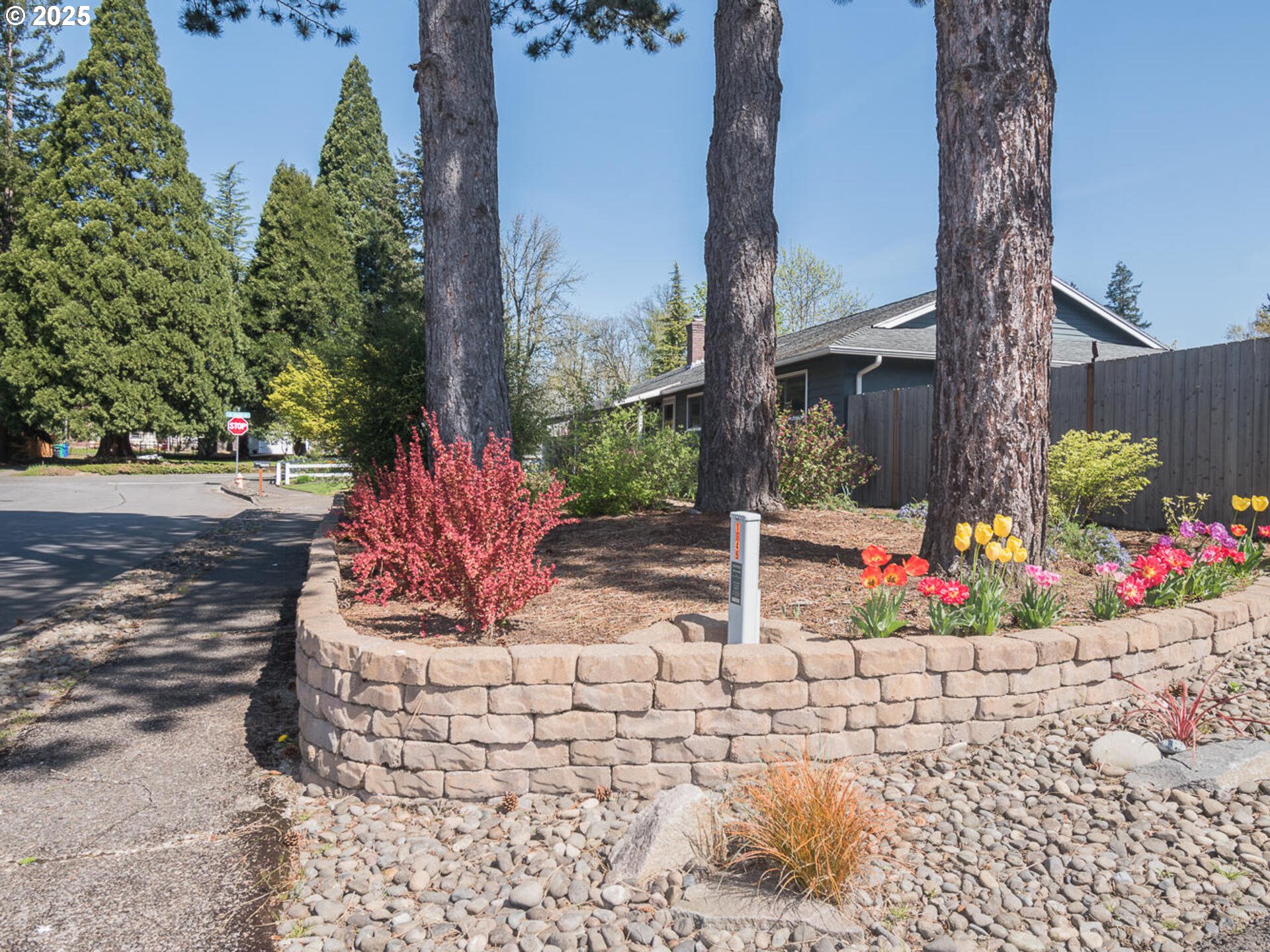 2548 Southeast Eagle Avenue Gresham, OR 97080 - Photo 3 of 32 a view of flower garden in front of building