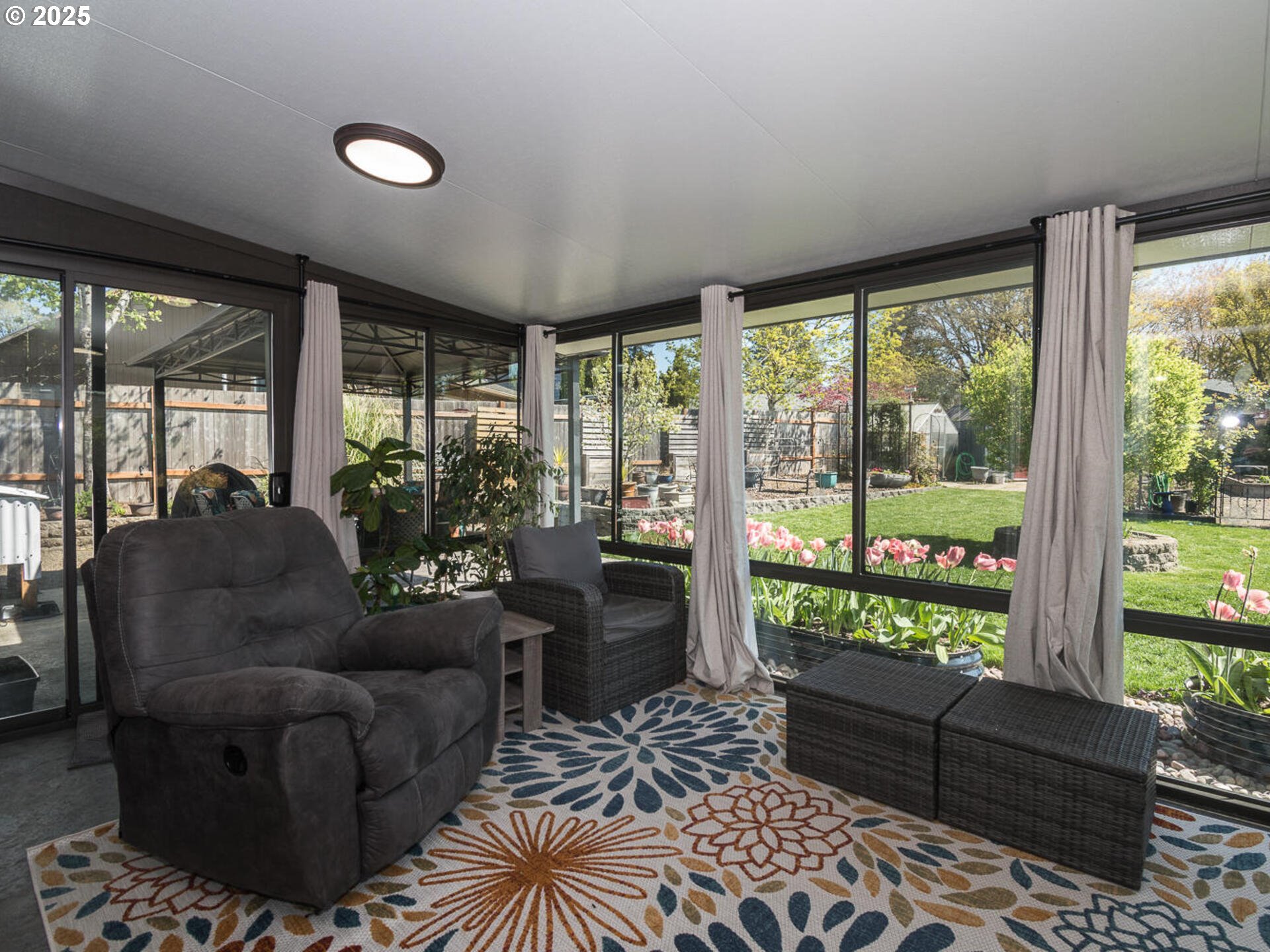 2548 Southeast Eagle Avenue Gresham, OR 97080 - Photo 8 of 32 a living room with furniture and a large window