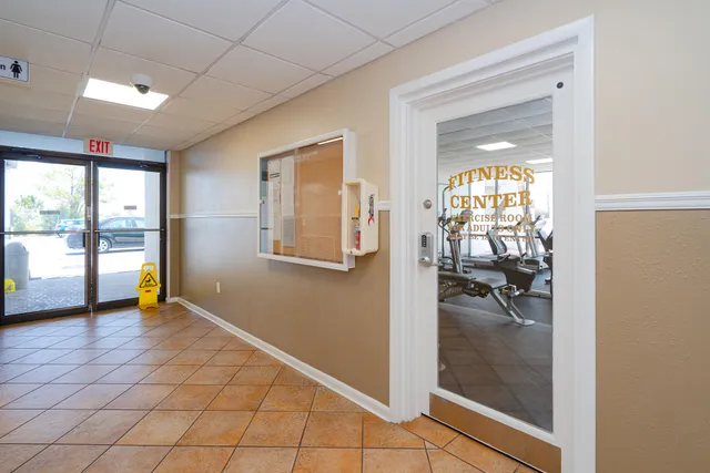 a view of a room with gym equipment
