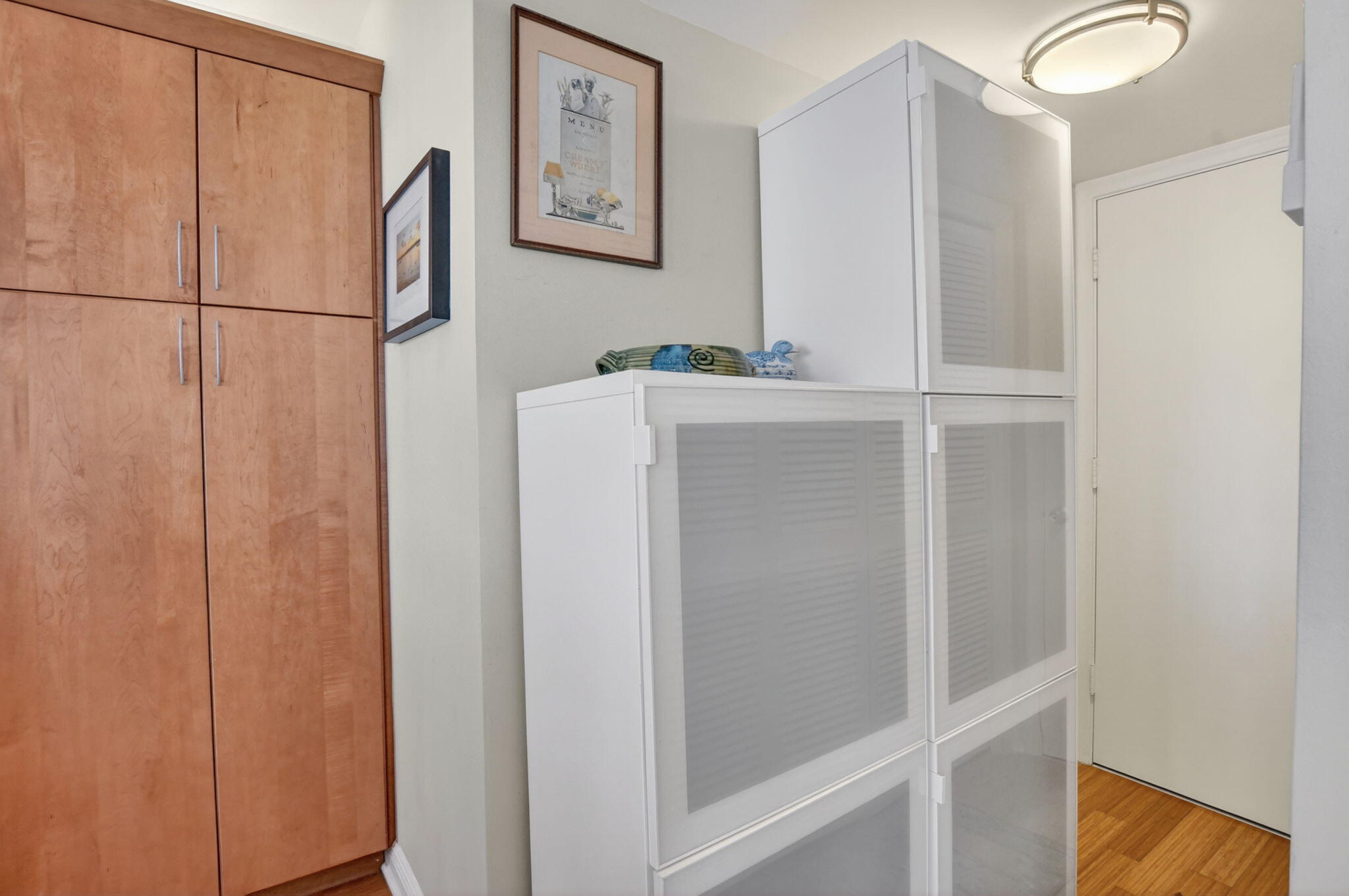1180 South Ocean Boulevard, Unit 55 Boca Raton, FL 33432 - Photo 17 of 43 across laundry rm