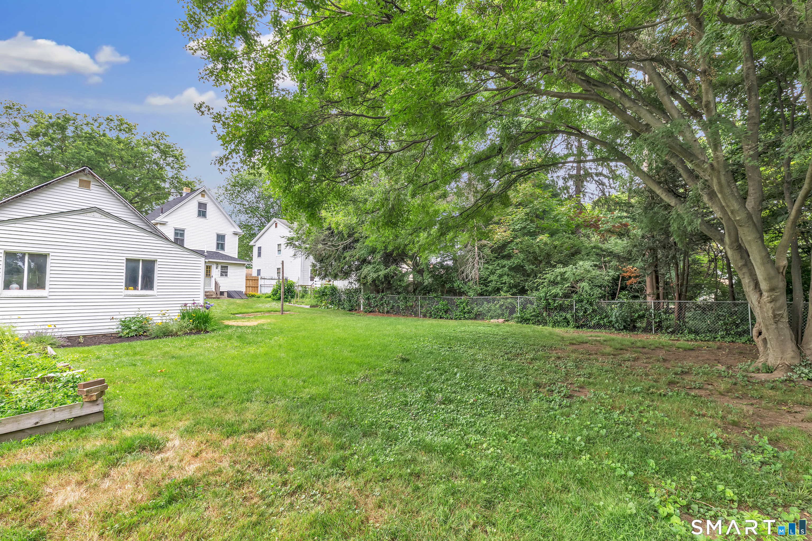 1326 Huntington Road Stratford, CT 06614 - Photo 34 of 37 Rear private Backyard .25 Acres - Built for Gardeninng and Entertaining