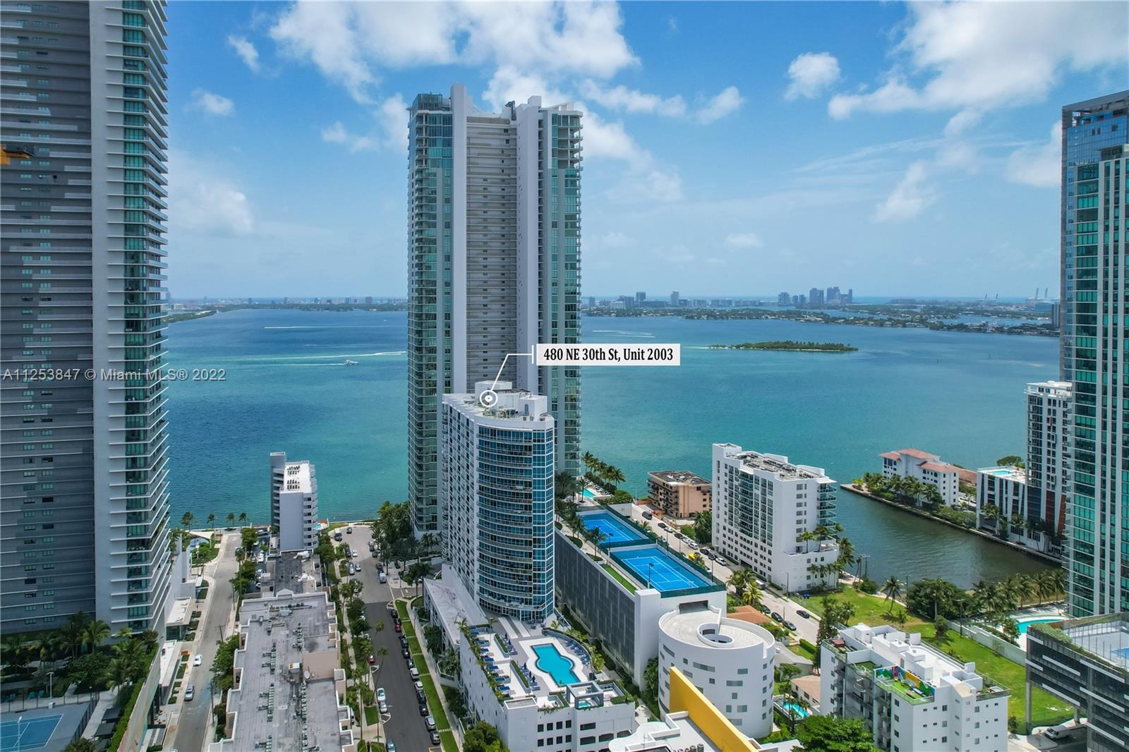 480 Northeast 30th Street, Unit 2003 Miami, FL 33137 - Photo 1 of 17 a terrace with outdoor seating and city view