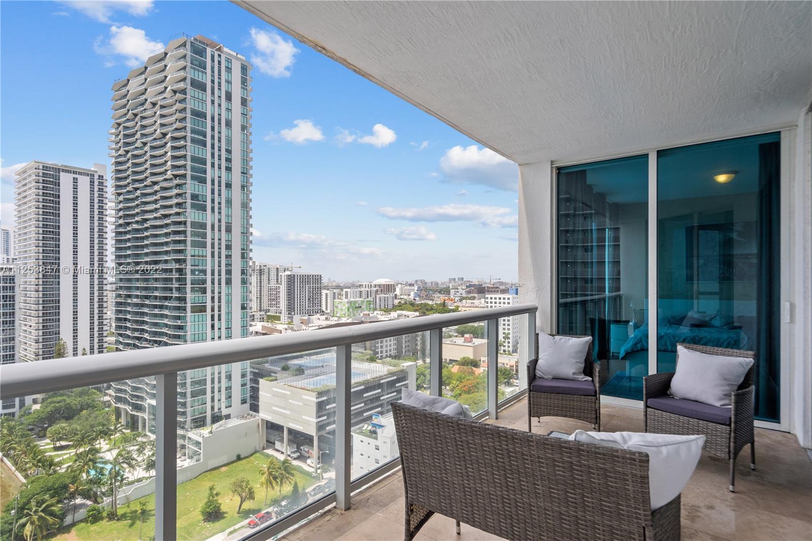 480 Northeast 30th Street, Unit 2003 Miami, FL 33137 - Photo 13 of 17 a view of balcony with couch