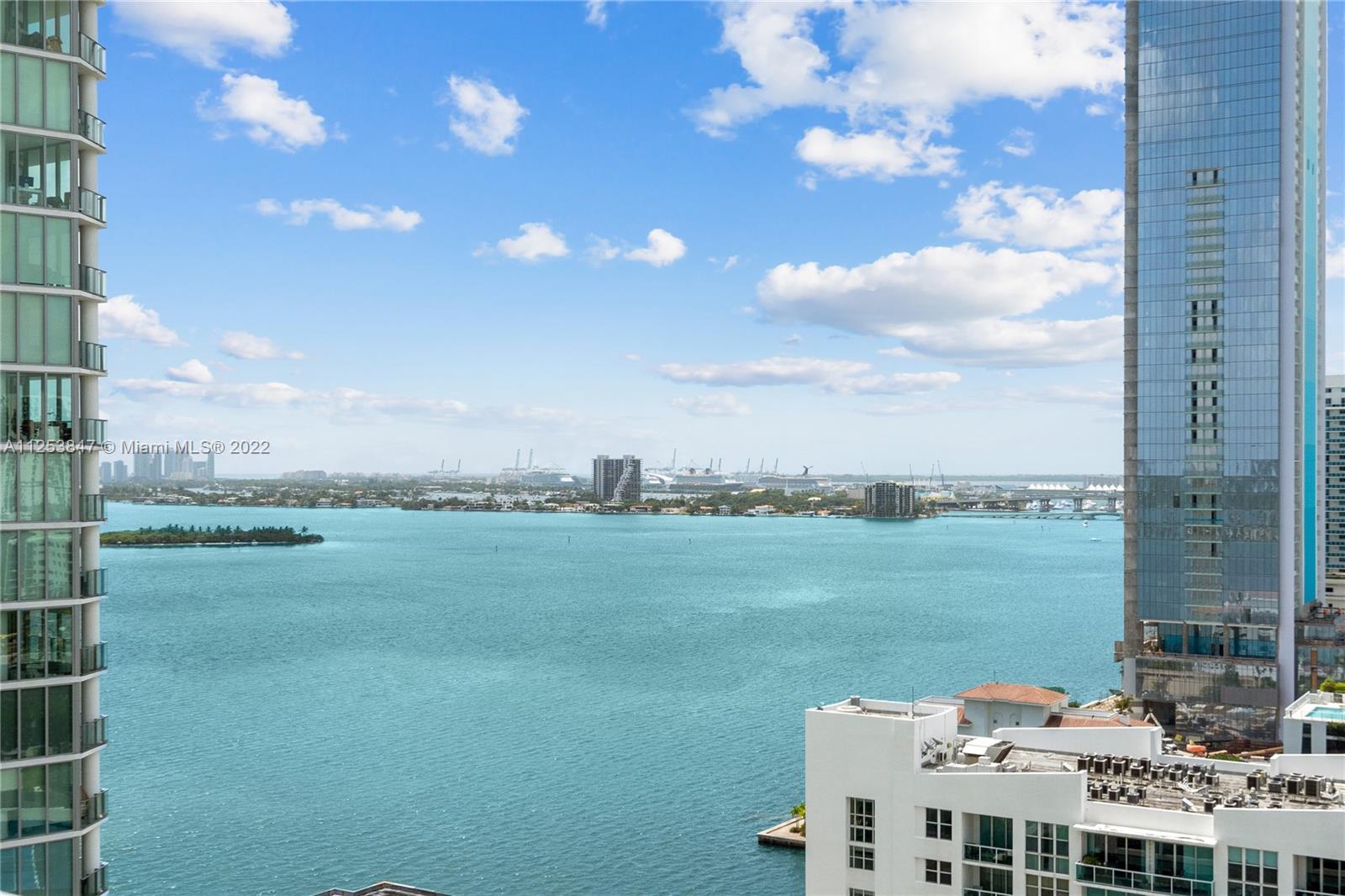 480 Northeast 30th Street, Unit 2003 Miami, FL 33137 - Photo 2 of 17 a view of a lake with a big yard