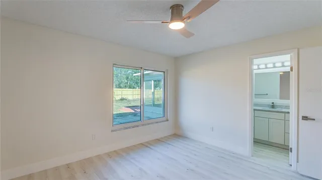 a view of an empty room and window