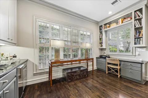 a kitchen with lots of counter top space and stainless steel appliances