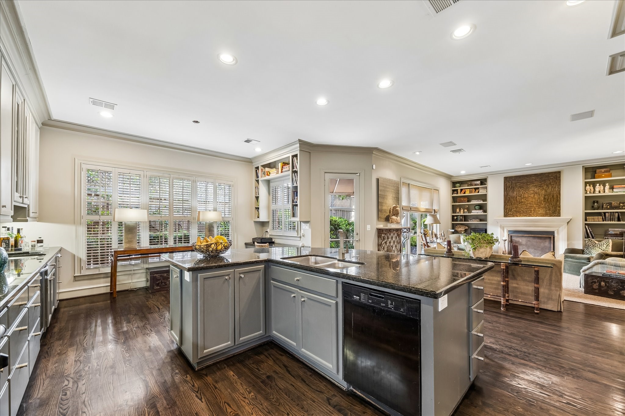 2627 Sutton Court Houston, TX 77027 - Photo 13 of 34 a kitchen with lots of counter top space and view of living room