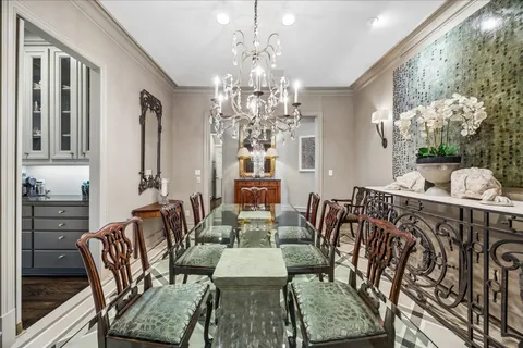 a kitchen with granite countertop stainless steel appliances a sink and cabinets