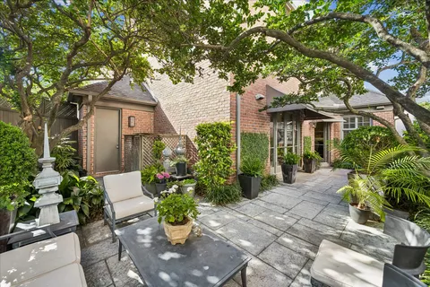 a view of a pathway both side of house