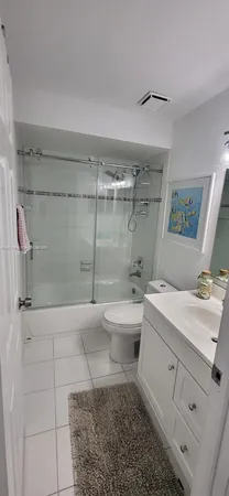 a view of a hallway with entryway