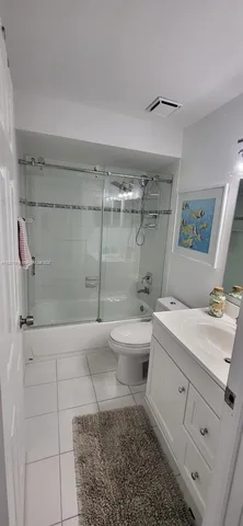 a view of a hallway with entryway