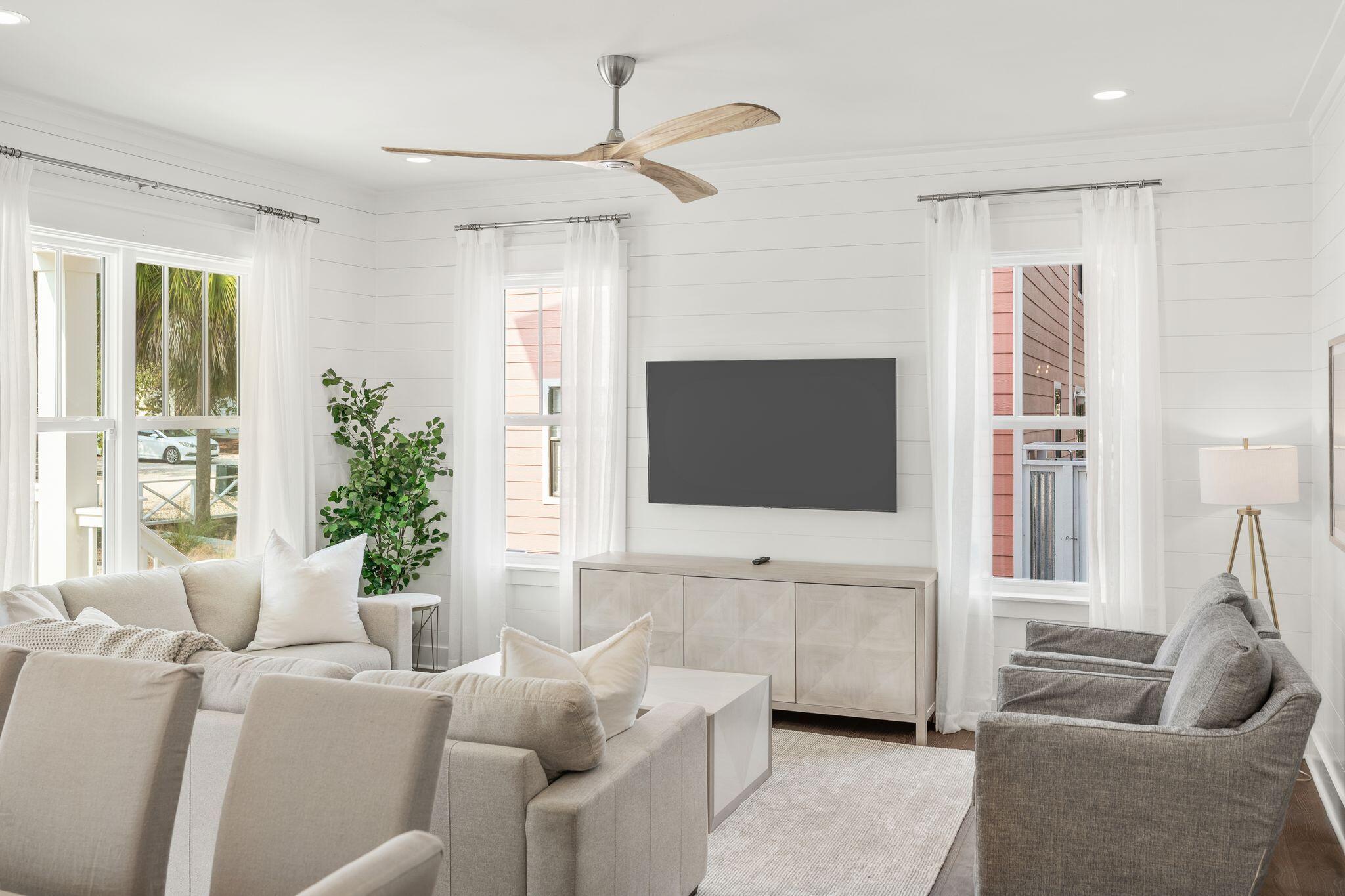76 Dalton Drive Santa Rosa Beach, FL 32459 - Photo 13 of 71 a living room with furniture and a flat screen tv