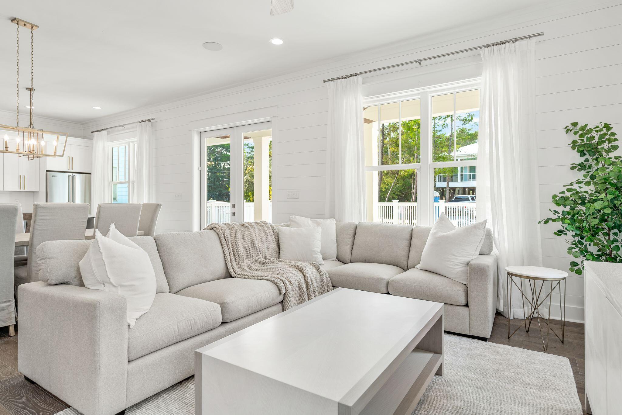 76 Dalton Drive Santa Rosa Beach, FL 32459 - Photo 16 of 71 a living room with furniture and a large window