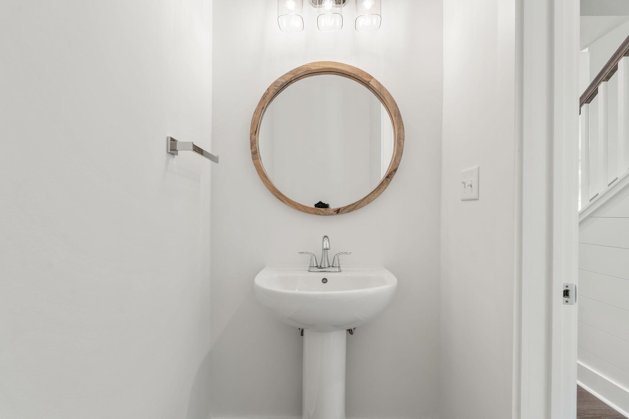 76 Dalton Drive Santa Rosa Beach, FL 32459 - Photo 17 of 71 a bathroom with a sink and a mirror