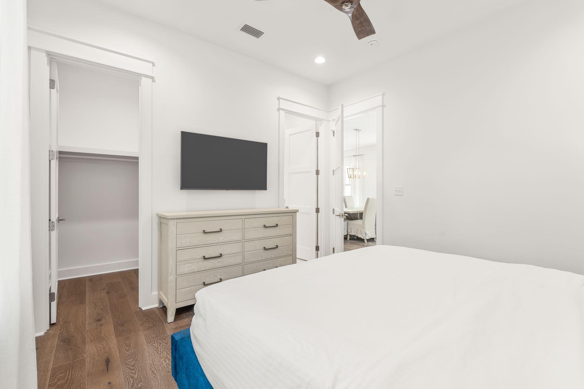 76 Dalton Drive Santa Rosa Beach, FL 32459 - Photo 19 of 71 a bedroom with a bed and a flat screen tv