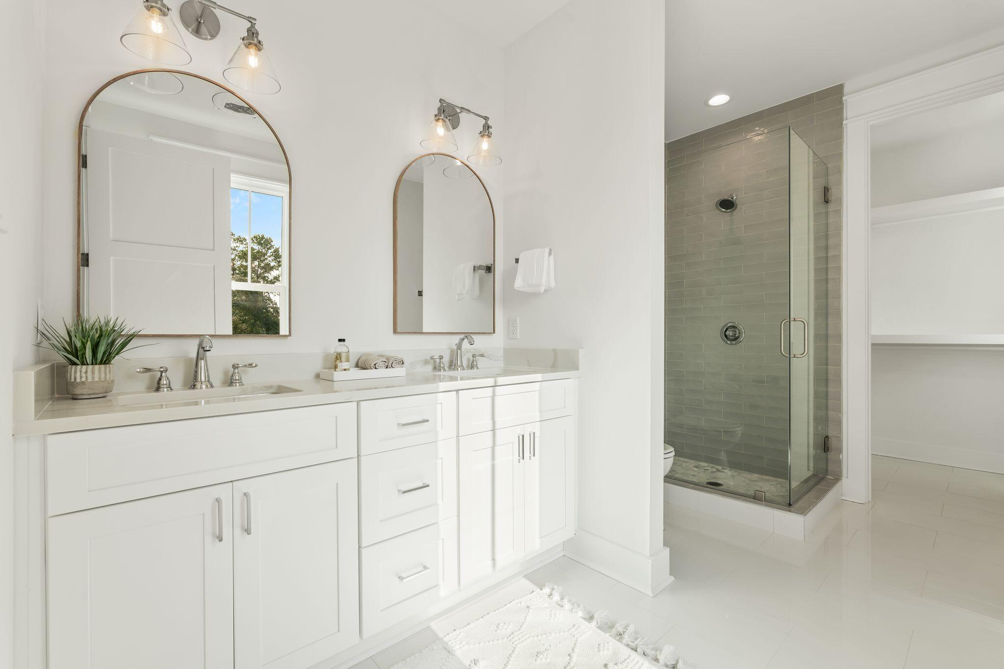 76 Dalton Drive Santa Rosa Beach, FL 32459 - Photo 24 of 71 a bathroom with a double vanity sink mirror and shower