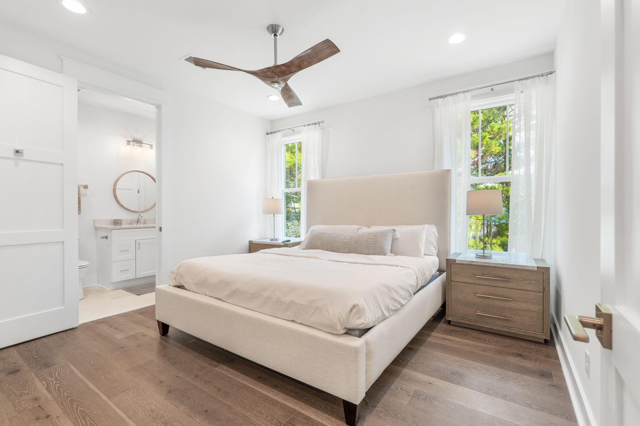 76 Dalton Drive Santa Rosa Beach, FL 32459 - Photo 34 of 71 a large bed sitting in a bedroom next to a window