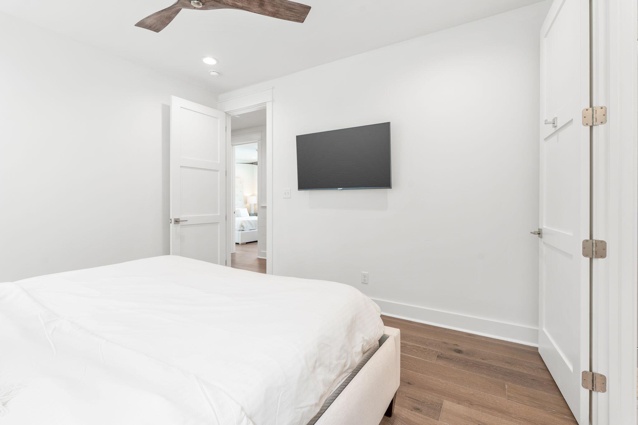 76 Dalton Drive Santa Rosa Beach, FL 32459 - Photo 35 of 71 a bedroom with a bed and a flat screen tv