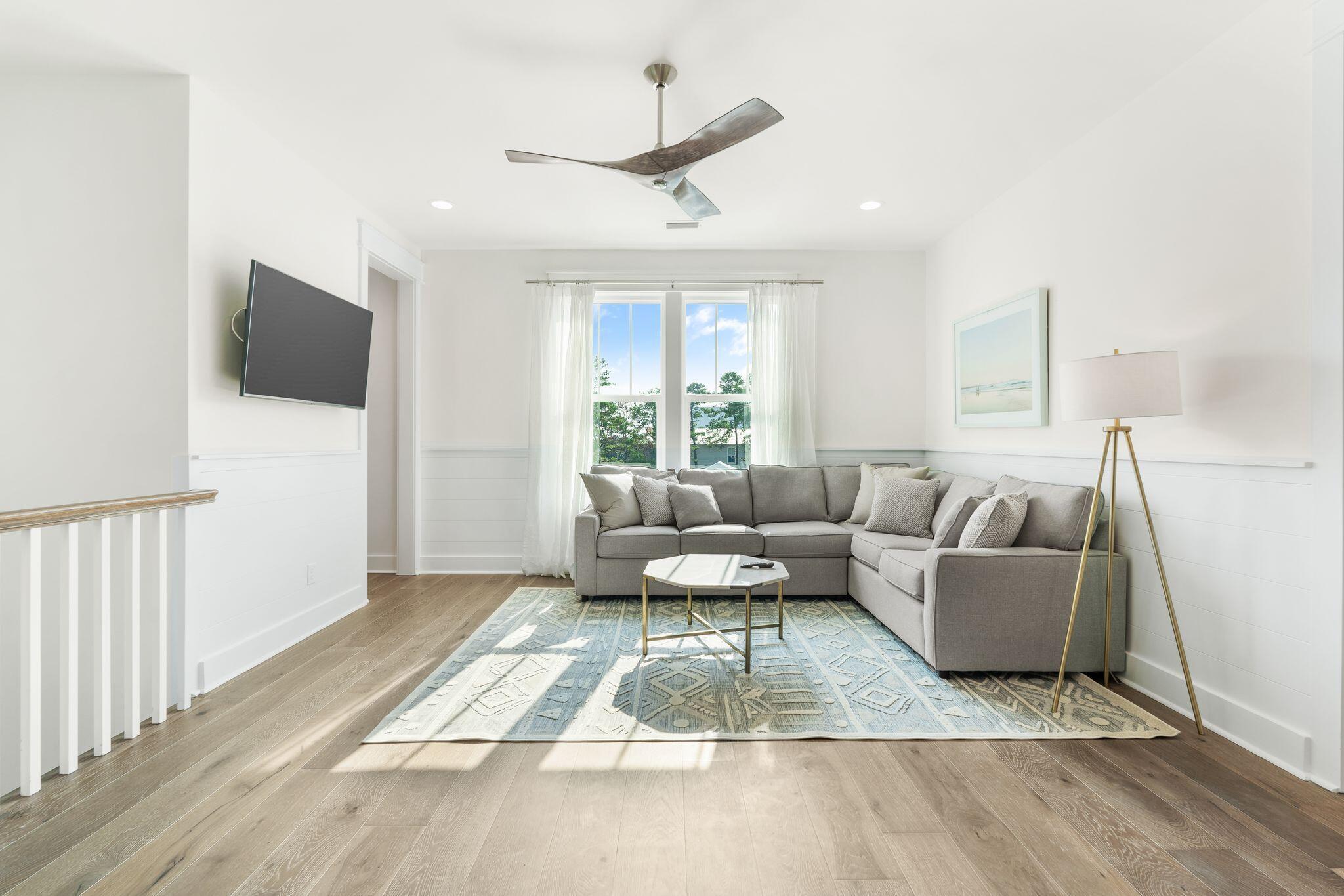 76 Dalton Drive Santa Rosa Beach, FL 32459 - Photo 40 of 71 a living room with furniture and a flat screen tv