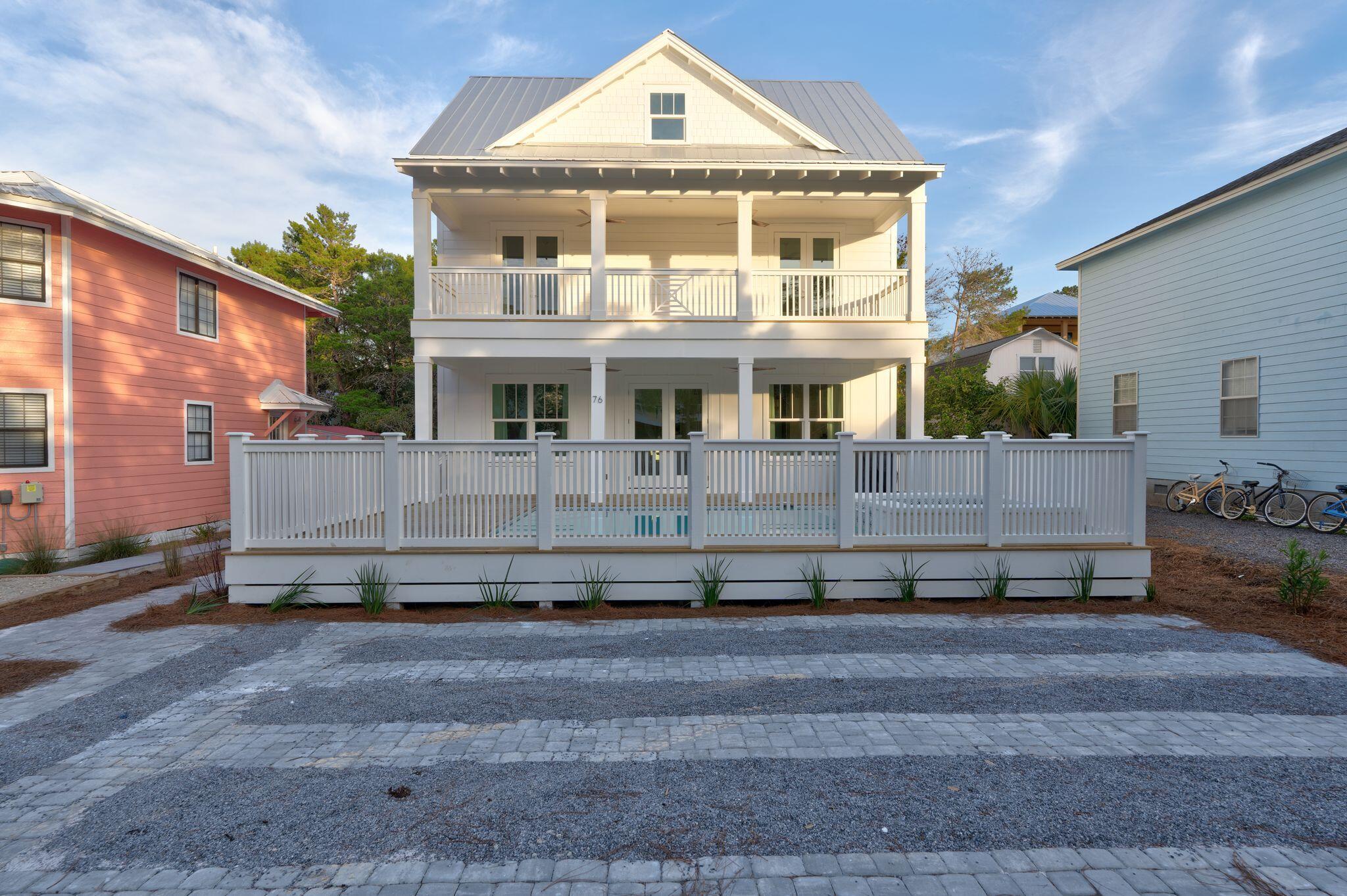 76 Dalton Drive Santa Rosa Beach, FL 32459 - Photo 53 of 71 a front view of a house with a yard