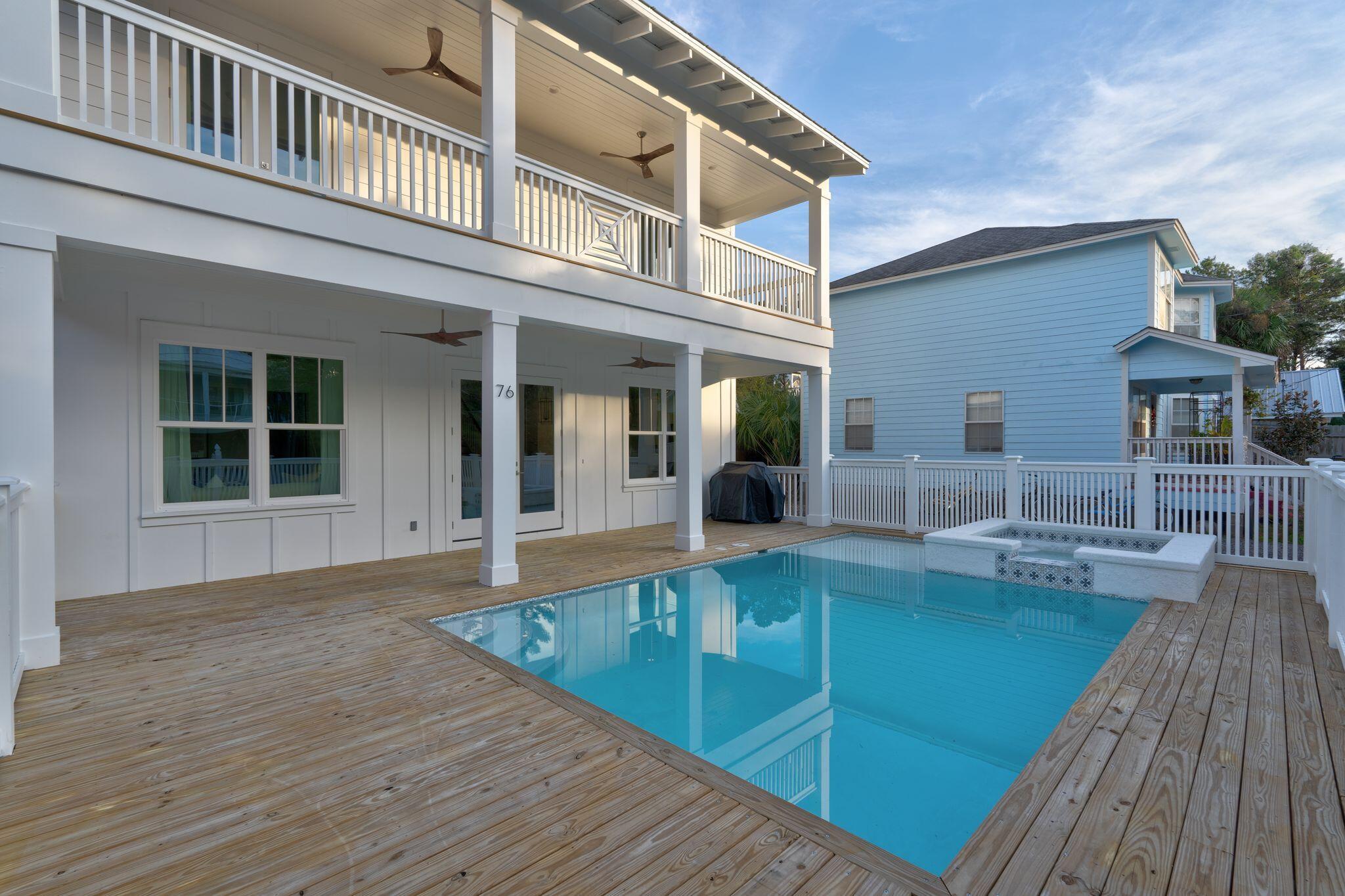 76 Dalton Drive Santa Rosa Beach, FL 32459 - Photo 55 of 71 a view of a house with pool fire pit and wooden floor