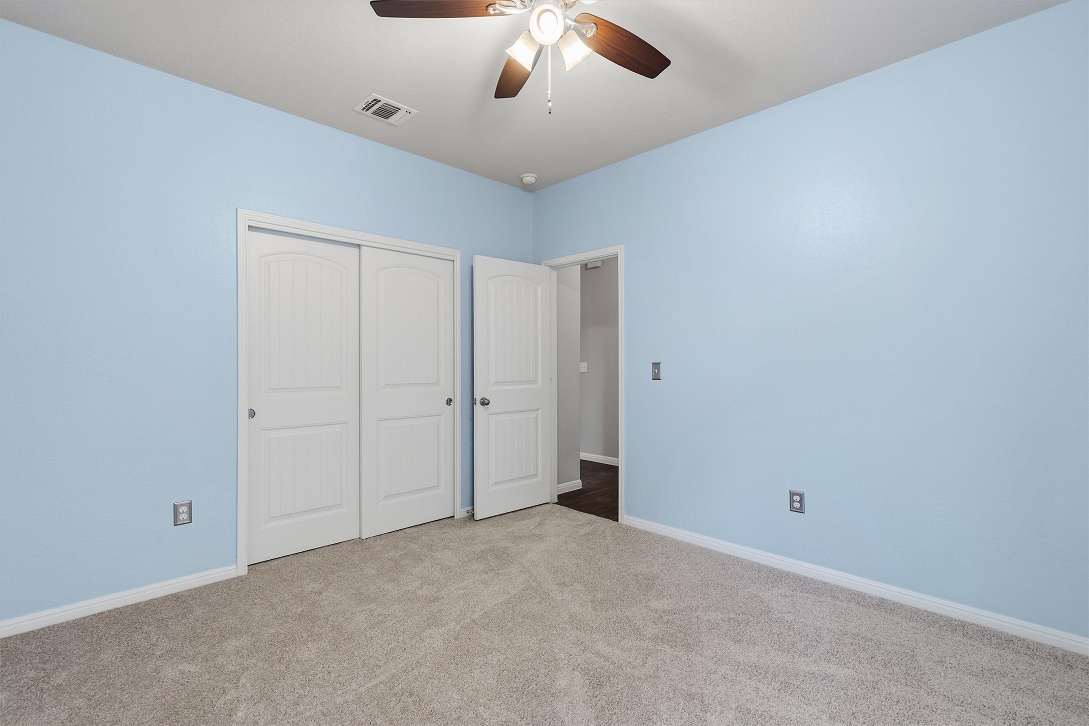 10817 Gonzales Ranger Pass Austin, TX 78754 - Photo 22 of 37 There is a spacious closet here as well, providing additional room for storage.