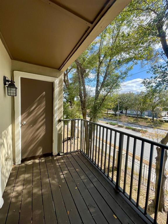 236 Afton Square, Unit 305 Altamonte Springs, FL 32714 - Photo 28 of 30 a view of wooden balcony