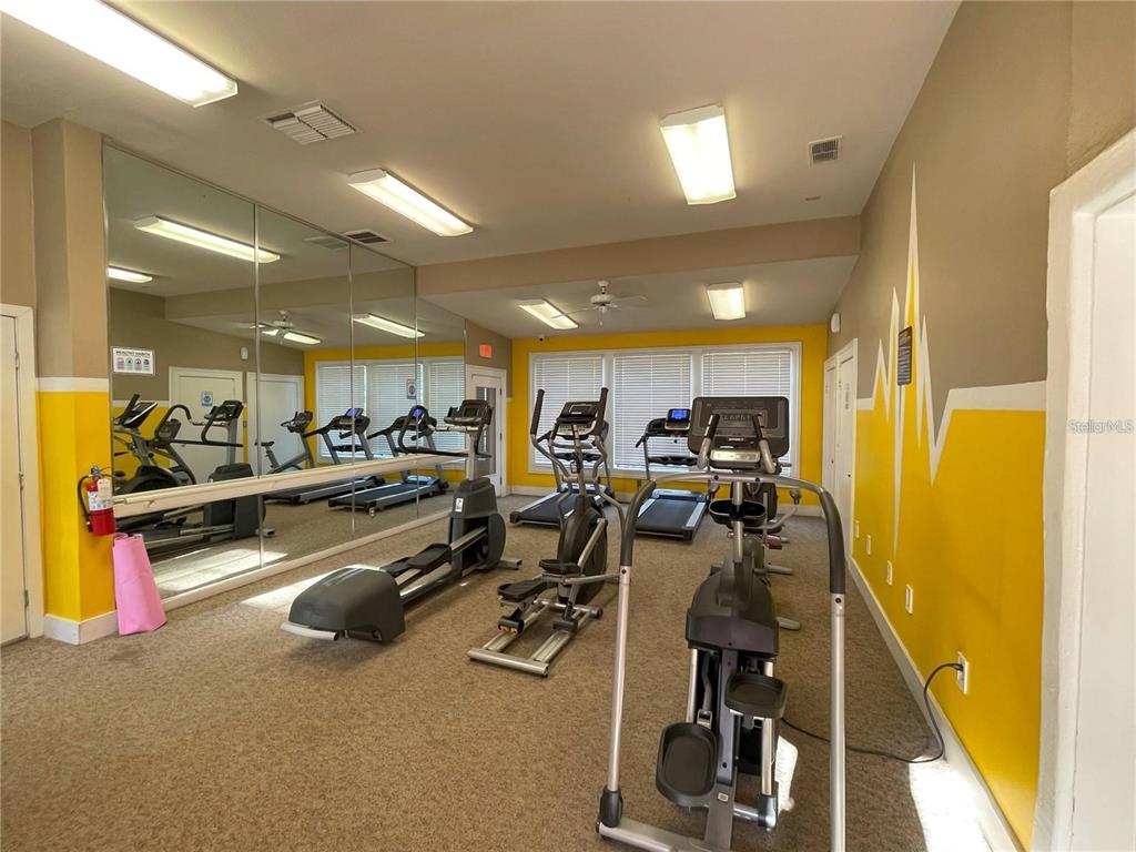 236 Afton Square, Unit 305 Altamonte Springs, FL 32714 - Photo 10 of 30 a view of a room with gym equipment