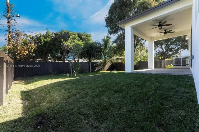 a view of a backyard with a garden