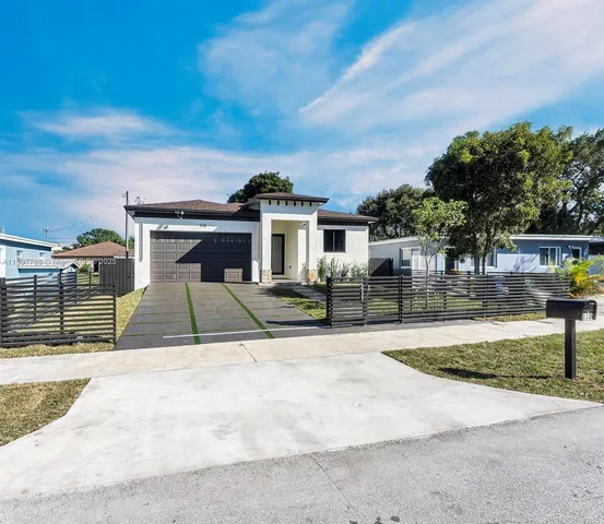 front view of a house with a patio