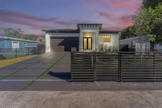 a yellow house with a outdoor space