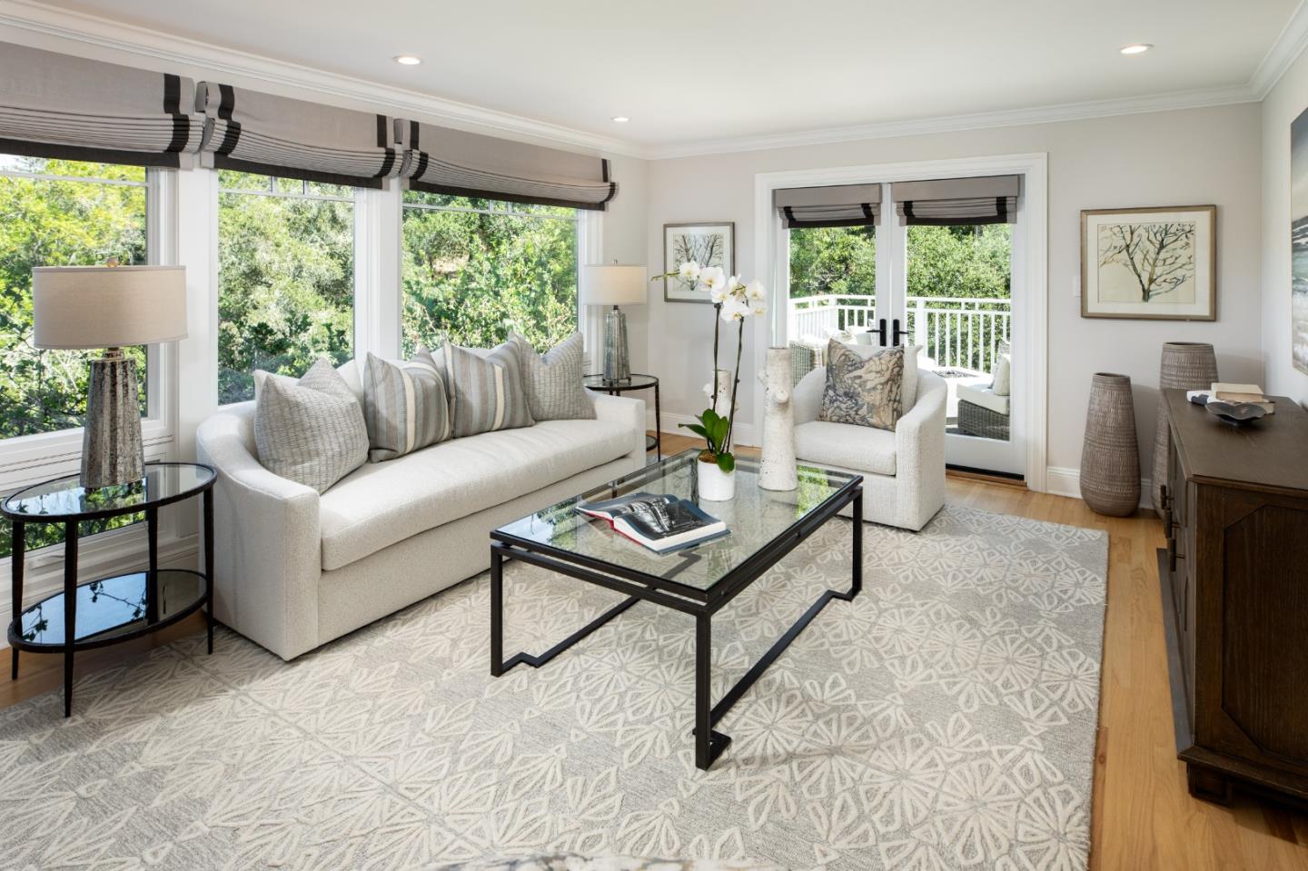 345 Harcross Road Woodside, CA 94062 - Photo 5 of 37 a living room with furniture and a large window