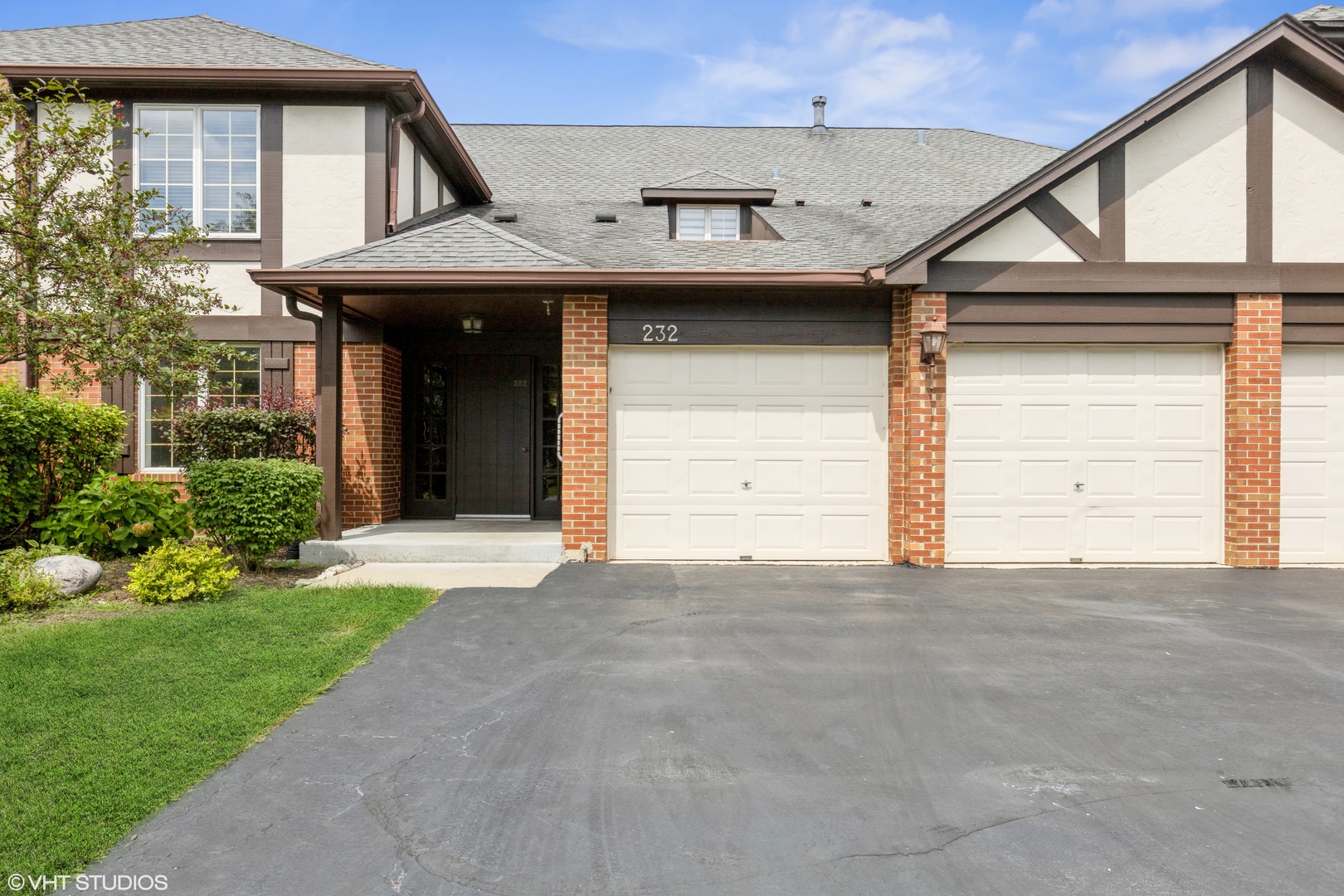 a view of a house with a outdoor space and porch