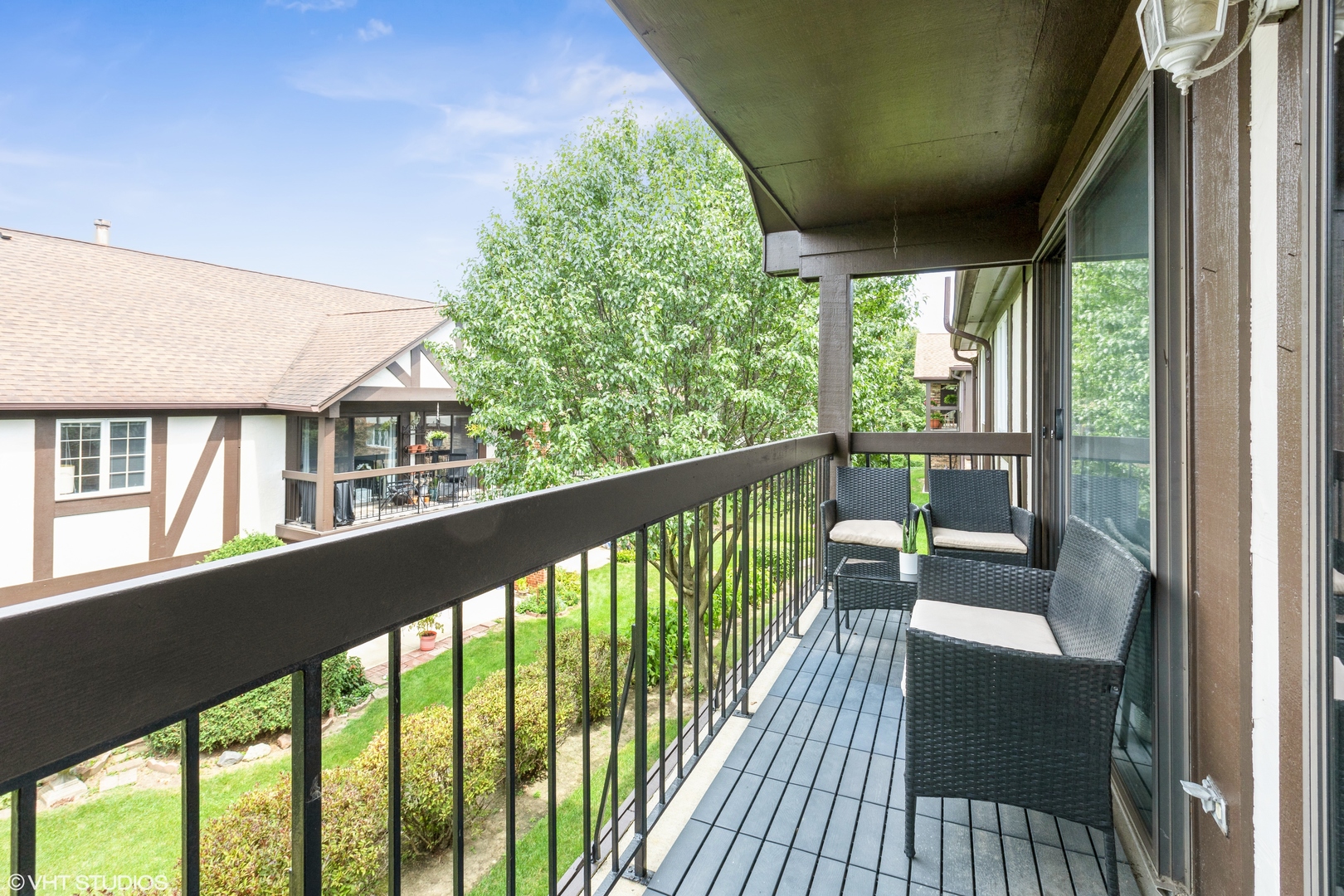 232 Stanhope Drive, Unit C Willowbrook, IL 60527 - Photo 12 of 12 a view of balcony with wooden floor
