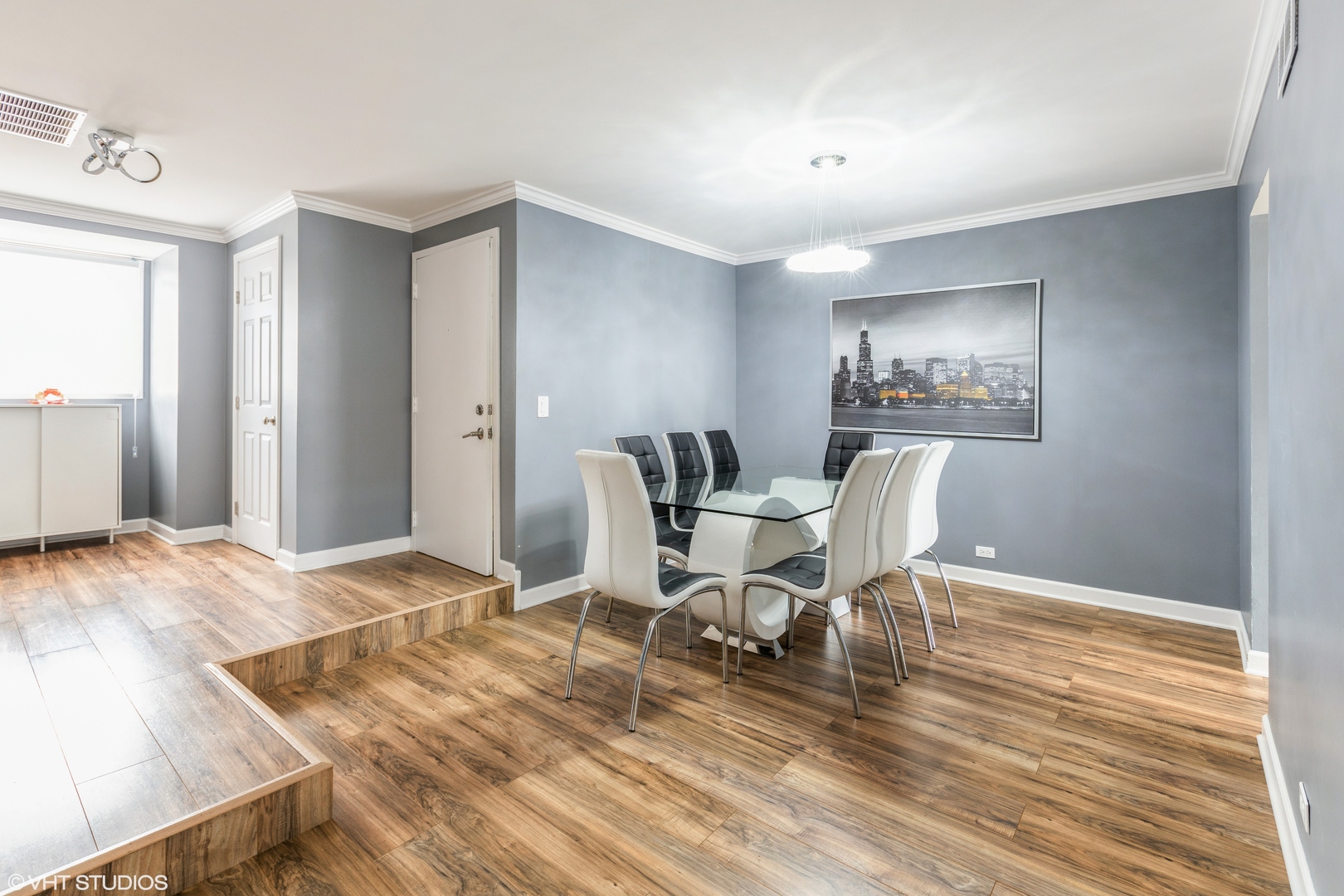 232 Stanhope Drive, Unit C Willowbrook, IL 60527 - Photo 2 of 12 a workspace with furniture and wooden floor