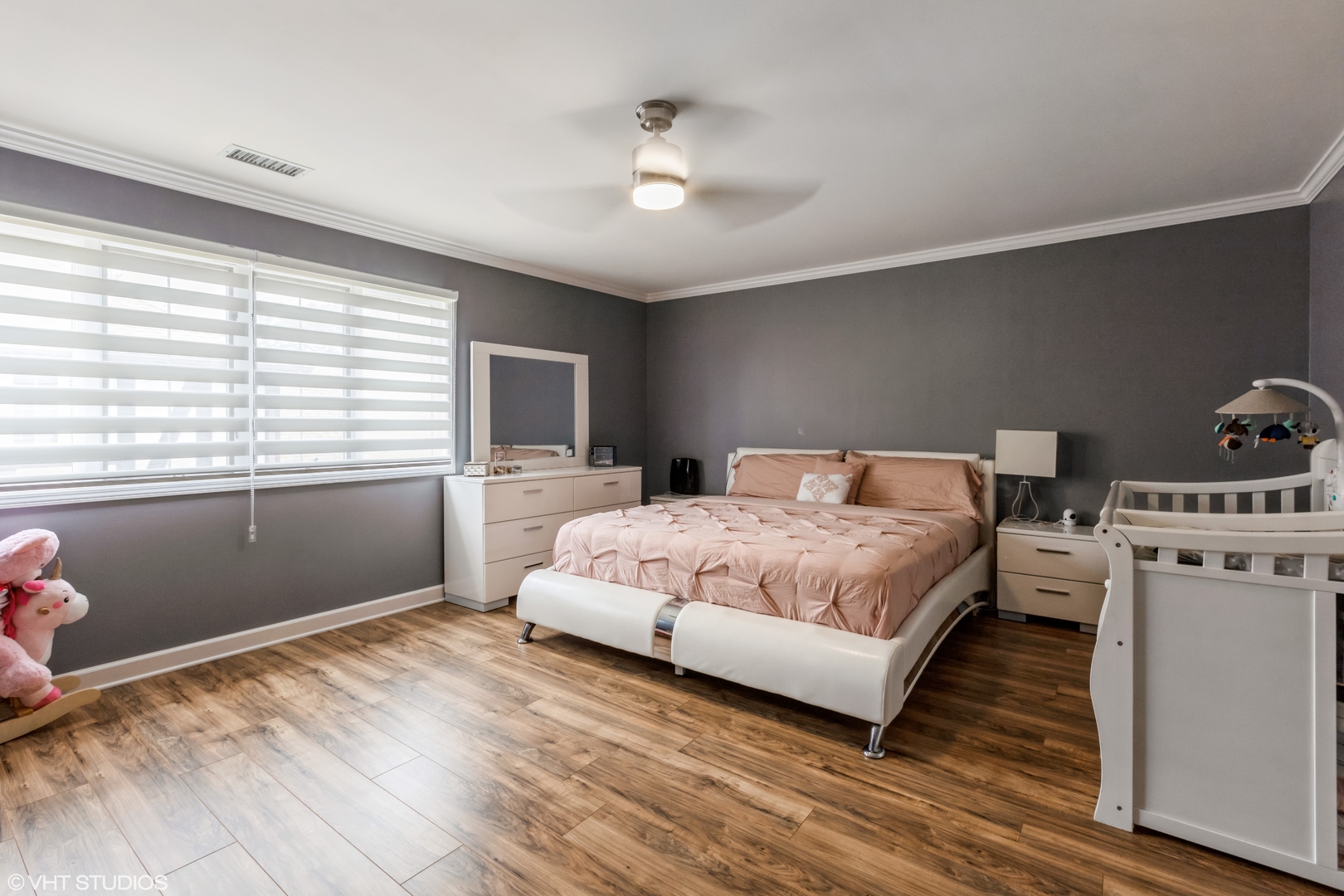 232 Stanhope Drive, Unit C Willowbrook, IL 60527 - Photo 7 of 12 a bedroom with a large bed and a window