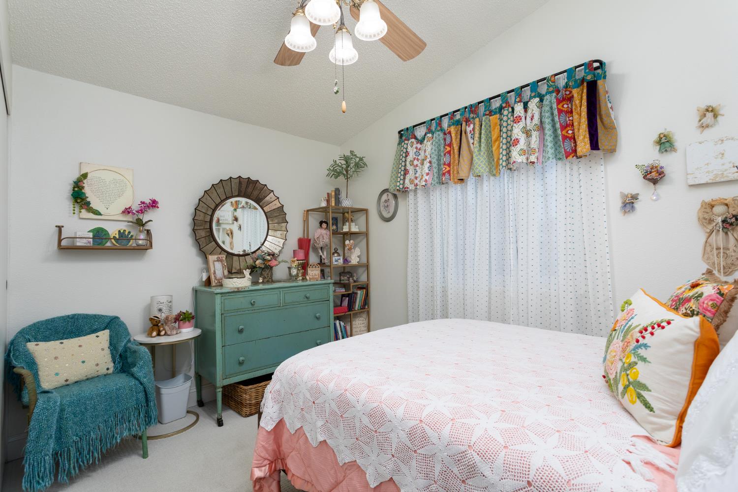 8701 Highway 41, Unit 52 Fresno, CA 93720 - Photo 16 of 66 a bedroom with a bed and a painting on the wall