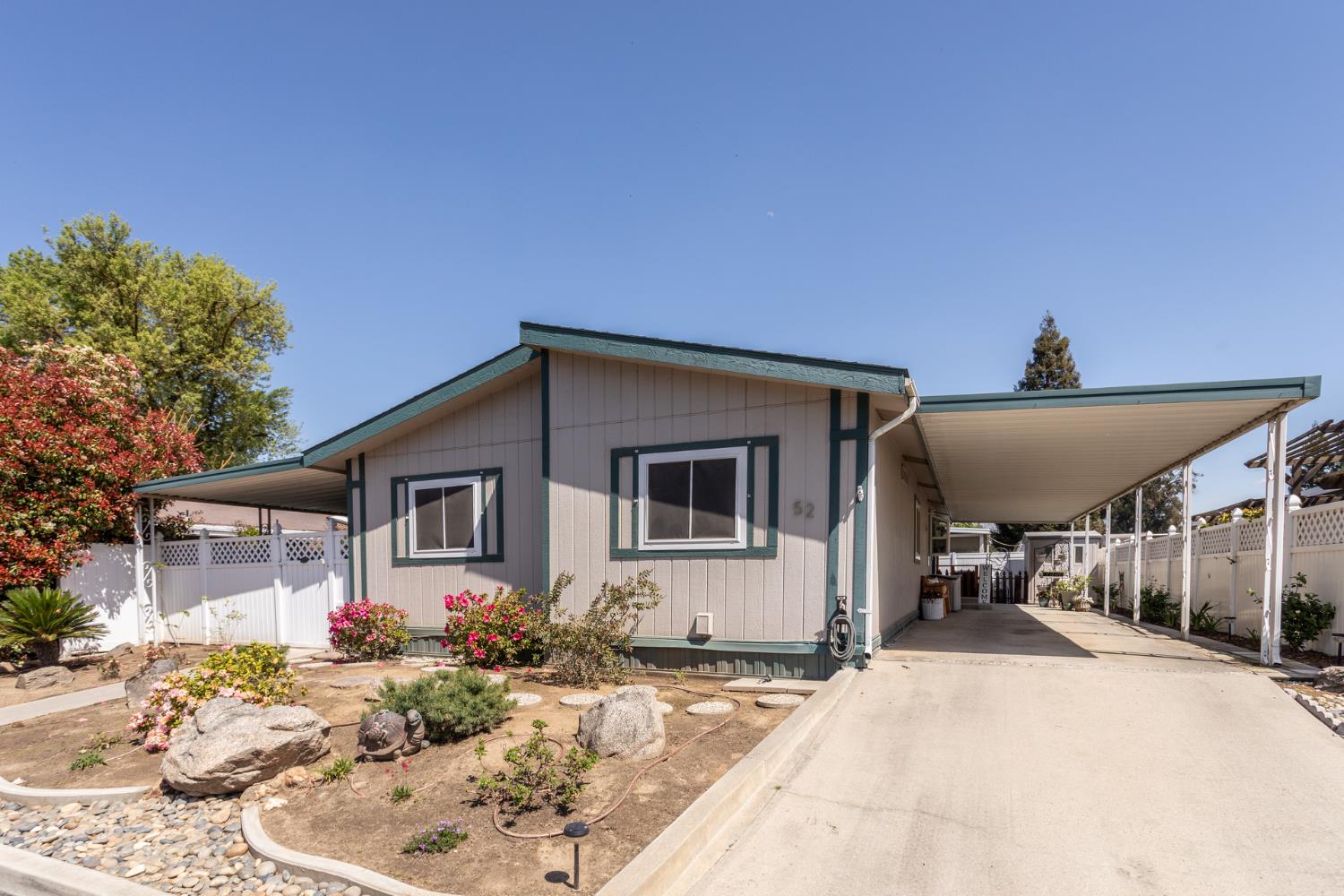8701 Highway 41, Unit 52 Fresno, CA 93720 - Photo 50 of 66 a front view of a house with a patio