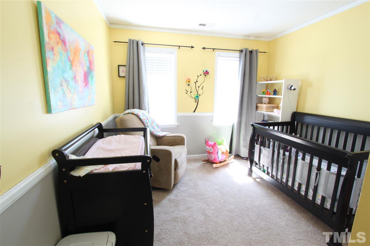9416 Dawnshire Road Raleigh, NC 27615 - Photo 12 of 17 a room with furniture and window