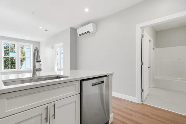 a view of a sink and a mirror