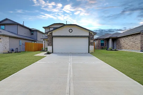 a front view of house with yard