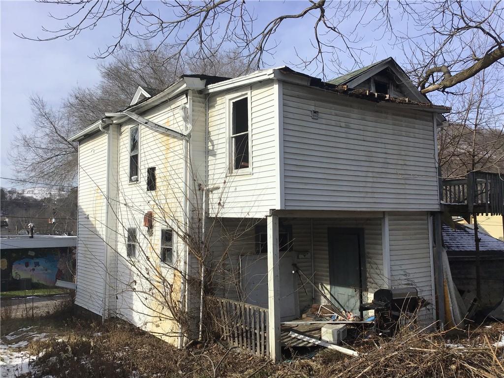 307 Wilson Way Apollo, PA 15613 - Photo 10 of 11 a view of a house with a yard and garage